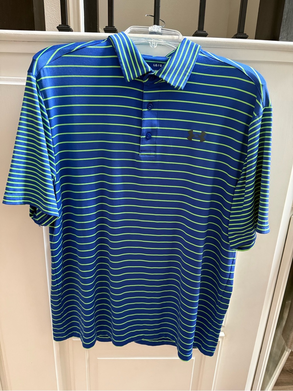 Under Armour Blue Polo Shirt with Green Stripes